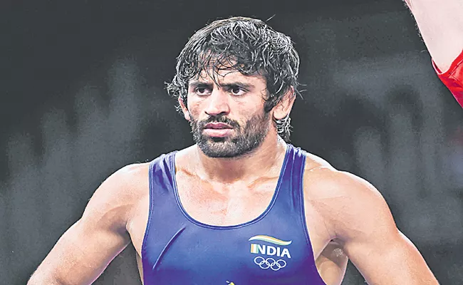 World Wrestling Championships: Bajrang Punia to fight for bronze medal as he qualifies for repechage - Sakshi