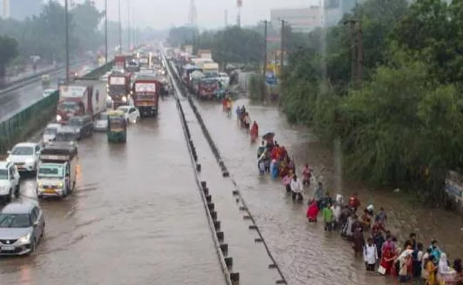 IMD Issued Yellow Alert In Delhi And Gurugram - Sakshi