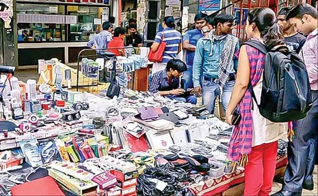 Rising Sales Of  Fake Brands Electronic Products Accessories In Indian Market - Sakshi