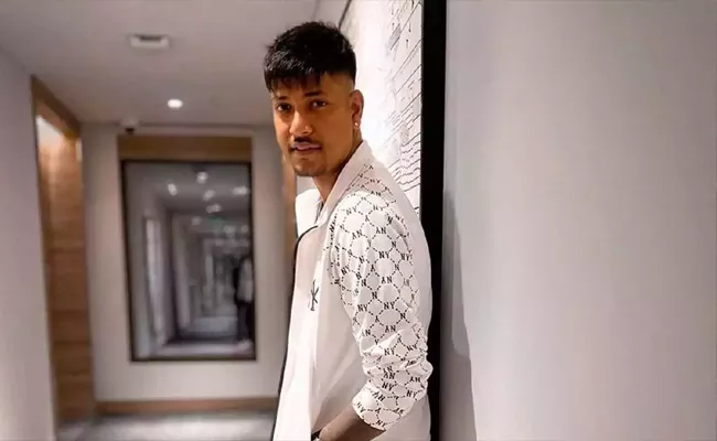 Nepal Seeks Interpol Help Find Fugitive Cricket Star Sandeep Lamichhane - Sakshi