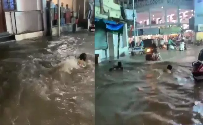 Viral: Heavy Rains Lash Several Parts Of Hyderabad, Heavy traffic, Waterlogging - Sakshi