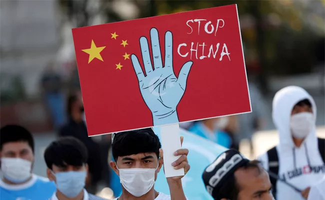 China Responsible For Human Rights Against Violations In Xinjiang Uno Report - Sakshi