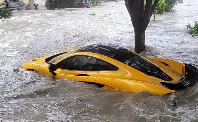 Hurricane: Florida Man Brand New 1 Million Doller McLaren Washed Away - Sakshi