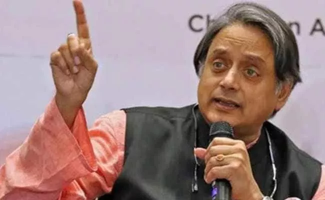 Shashi Tharoor Said That Gandhis Are A Part Of Congress DNA - Sakshi