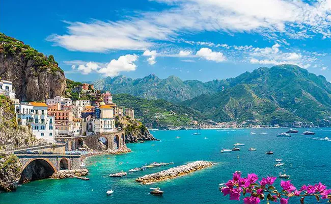 Italy is offering to pay people 12 lakhs to move to the island of Sardinia - Sakshi