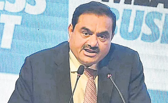 Adani group says not overleveraged, loans from public sector banks halved - Sakshi