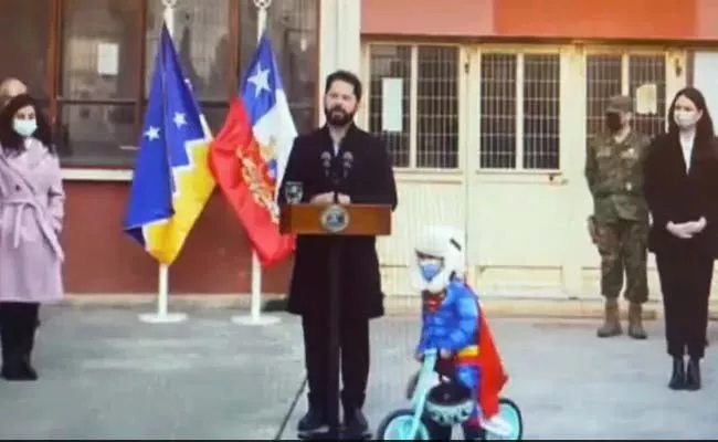 Viral Video: Boy Dressed Superman Cycles Around Chiles President - Sakshi