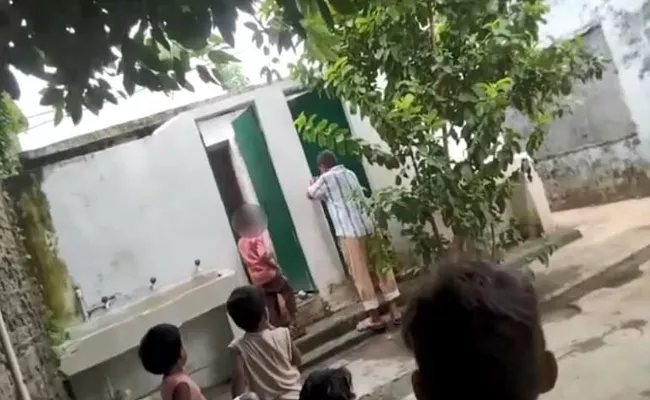 Viral Video: Primary School Students Made To Clean Toilet By Principal in UP - Sakshi