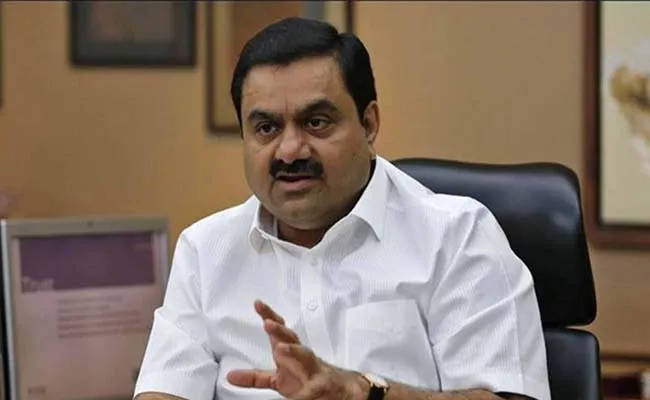 Billionaire Gautam Adani talks with investors to raise usd 10 billion to expand biz - Sakshi