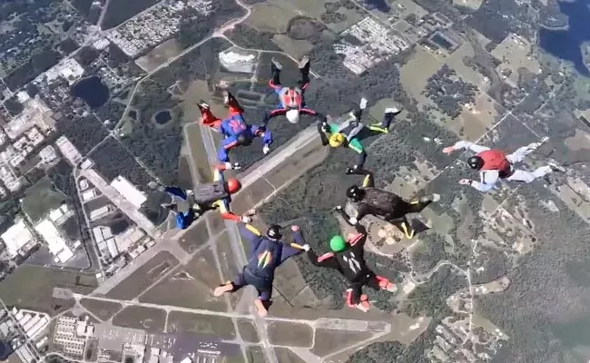 Eight People Over Age 80 Set world Record by Jumping Out of Plane - Sakshi