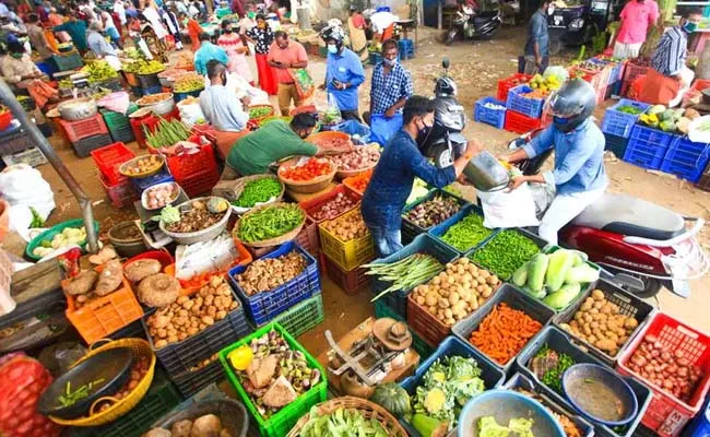 September Retail inflation rises surging food prices - Sakshi