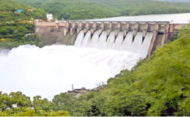 Telangana: Nine Gates Lifted In Srisailam Dam - Sakshi