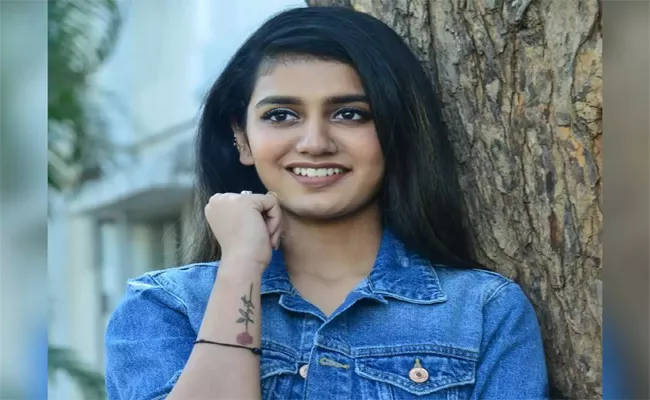 Priya Prakash Varrier calls Dhanush her celebrity crush - Sakshi