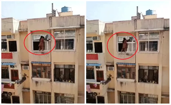 Woman Stands On the Ledge of Window, Heart Stopping Clip Viral - Sakshi