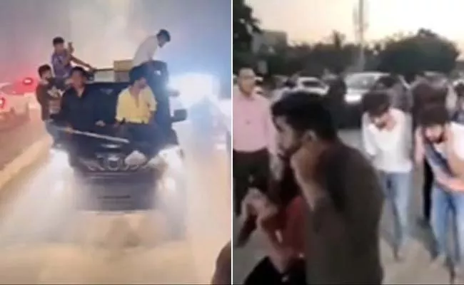 Viral Video: Group Of Men Bursting Firecrackers On Moving Cars Roof - Sakshi