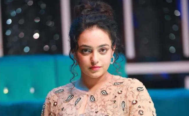 Nithya Menen Shares Pregnancy Kit photo And fans confused - Sakshi