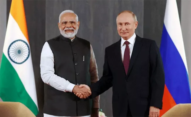 PM Modi A Patriot, Future Belongs To India: Russia President Putin - Sakshi