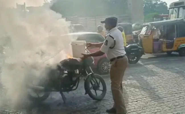 Biker Set Fire For Imposing Bike Challan At Hyderabad - Sakshi