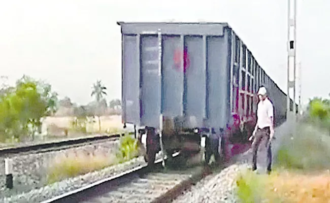 Goods Train Bogies Cut Off In Khammam District - Sakshi