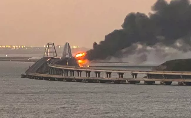 Viral Video: Huge Explosion On Only Bridge Linking Crimea To Russia - Sakshi