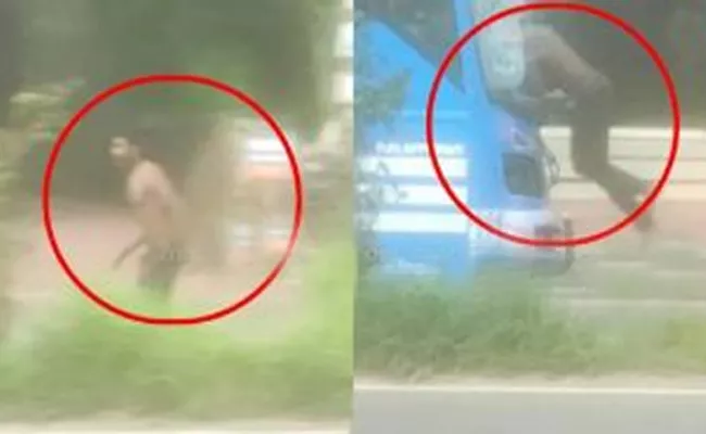 Kerala Man Jumping Before moving bus breaks windshield Viral - Sakshi