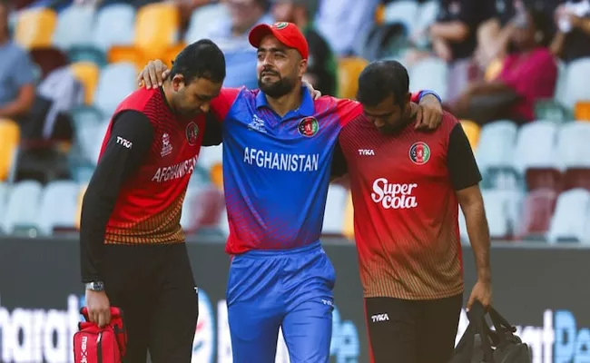 Rashid Khan Gets Injured While Fielding During Against Sri Lanka - Sakshi