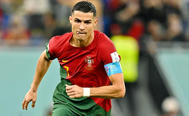 Cristiano Ronaldo becomes first Player to score in FIVE consecutive World Cups - Sakshi