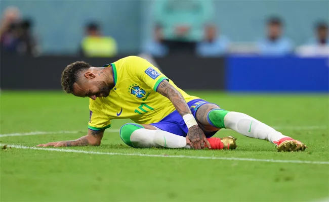 Brazils Neymar to miss Switzerland World Cup match - Sakshi