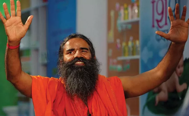 Yoga Guru Ramdev Baba Controversial Statement Women Dressing - Sakshi