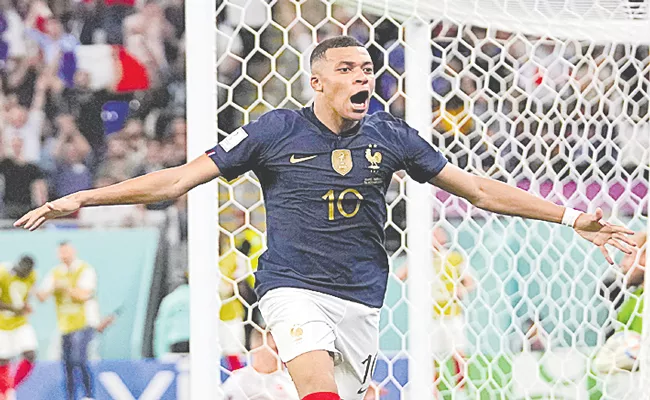 FIFA World Cup Qatar 2022: Mbappe double takes France into World Cup knockout stage - Sakshi