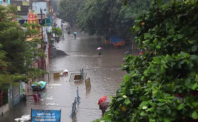 Chennai Rains: Orange Alert Issued in Parts of Tamil Nadu - Sakshi