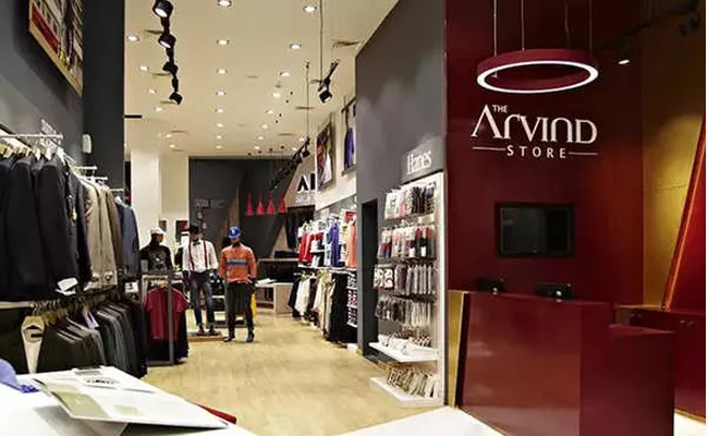 Arvind Ltd Net Profit Rises To Rs 125 Crore - Sakshi