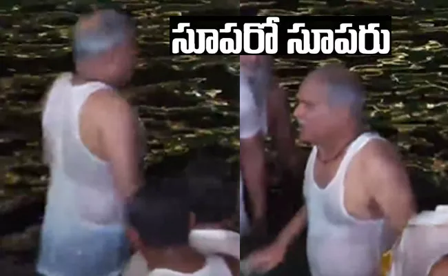 Chhattisgarh CM Bhupesh Baghel Swimming, Holy Dip - Sakshi