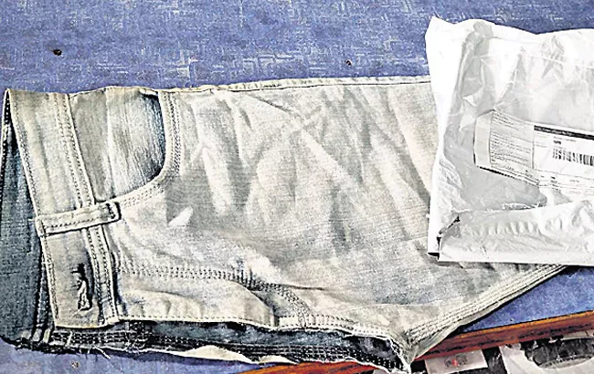 Customer From NTR District Got Torn Pants Instead Saree - Sakshi