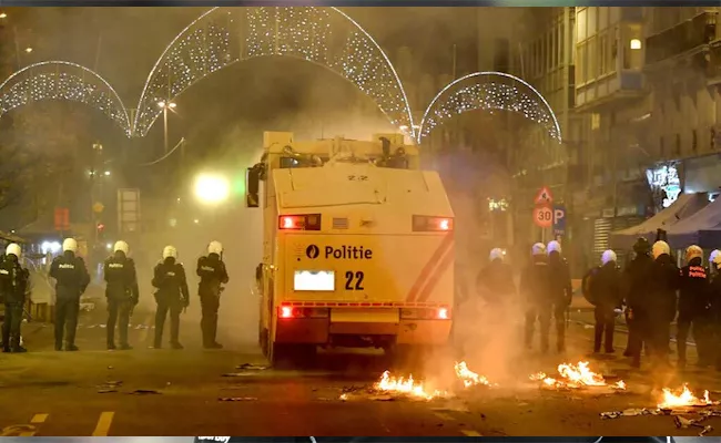 Moroccan fans briefly clash with police in Brussels after FIFA World Cup defeat - Sakshi