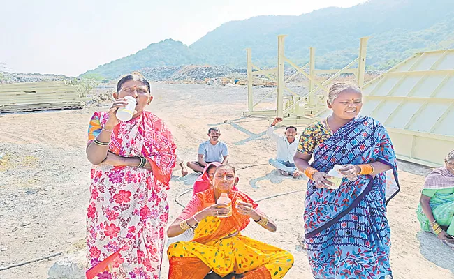 Telangana: Farmers Protest With Pesticide Cans Over Lands - Sakshi