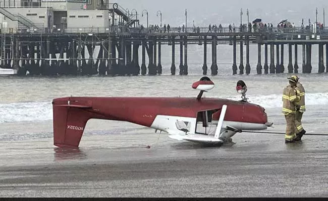 Viral Video: Small Plane Flips Upside Down After Crashing On US Beach - Sakshi