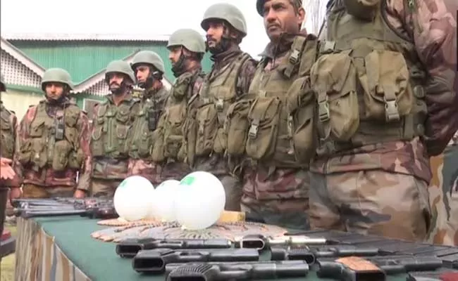 Indian Army Jammu And Kashmir Police Recovered Huge War Arms Store - Sakshi