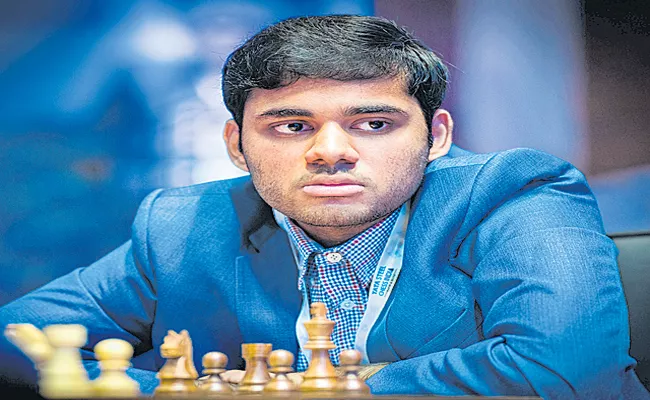 World Rapid Chess Championship: Erigaisi holds Carlsen, shares lead - Sakshi