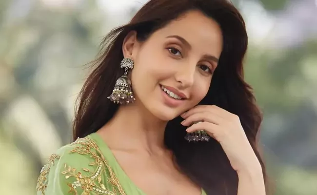 RS 200 Crore Fraud Case: Nora Fatehi Appears Before Enforcement Directorate - Sakshi