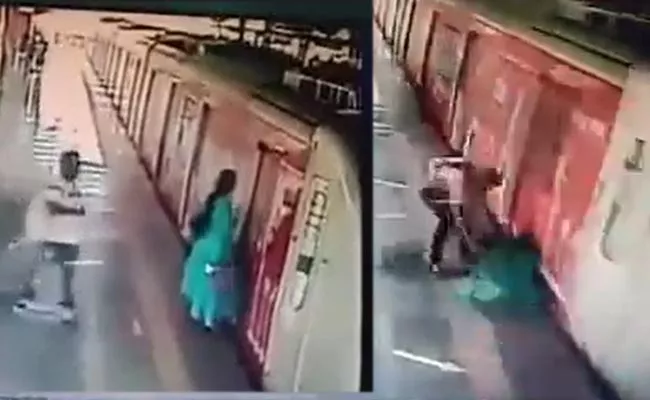 Woman Dragged After Her Dress Gets Stuck In Mumbai Metro Train Door - Sakshi