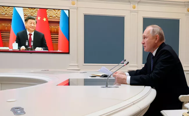 President Xi Jinping Had a Virtual Meeting with Russian President Vladimir Putin - Sakshi