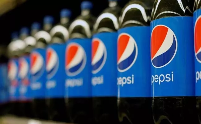 PepsiCo to layoffs hundreds of corporate jobs - Sakshi