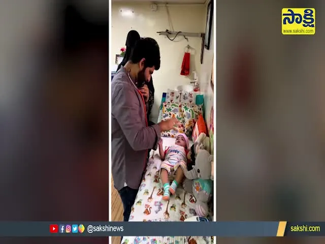 Doctor Distracts Baby While Giving Vaccination Shot Video Gone Viral