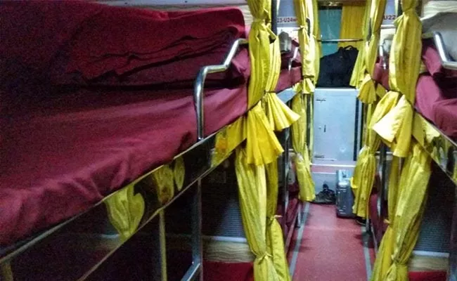 Private Travels bus Passenger toilet falling Exit Door Died  Eluru - Sakshi