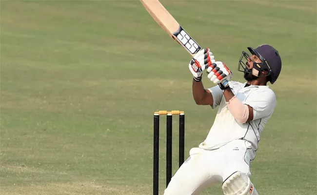 Ricky Bhui Hits Half Century Against Saurashtra Ranji Trophy - Sakshi