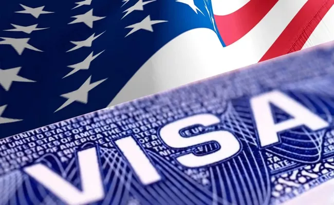 US is trying its best to eliminate visa wait times in India - Sakshi