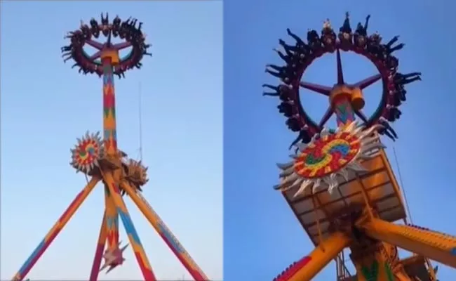 Tourists Hang Upside Down On Broken Amusement Park Ride At China - Sakshi