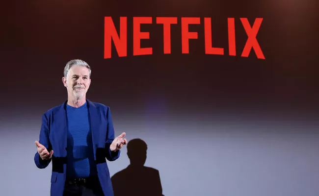 Netflix Also Announced That Co founder Reed Hastings Was Standing Down As Ceo - Sakshi