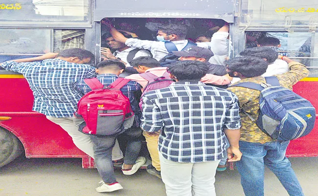 Hyderabad: Students Hang On Footboard Journey - Sakshi